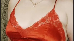 juicy redhead in a red dress