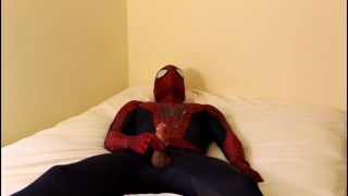 spiderman jerks off and cums all over his suit