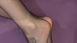 she caresses my cock with her nylon feet then I cum on her nylon legs after a blowjob